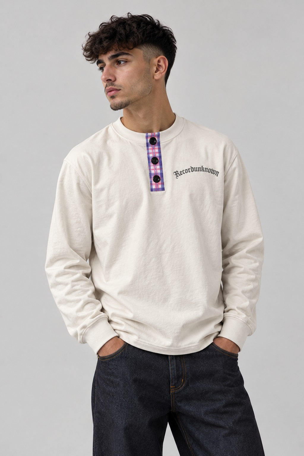 Close-up of the Recordunknown bone henley on a model