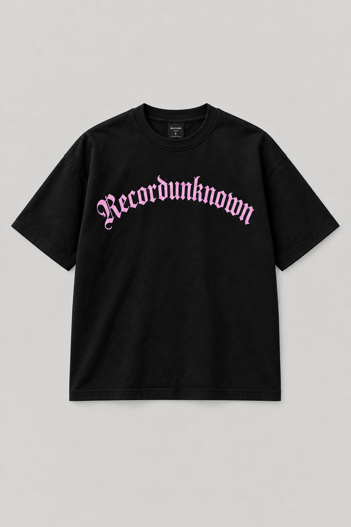 Recordunknown black oversized logo tee with baby-pink arched logo, front view