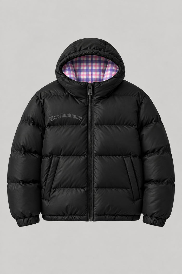 Recordunknown black puffer jacket with flannel plaid lining, front view