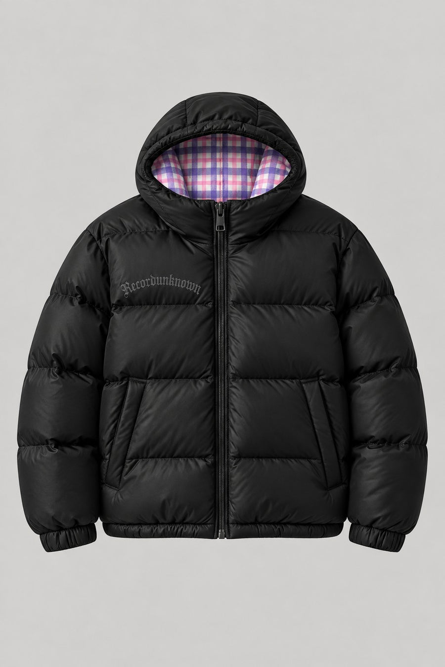Recordunknown black puffer jacket with flannel plaid lining, front view