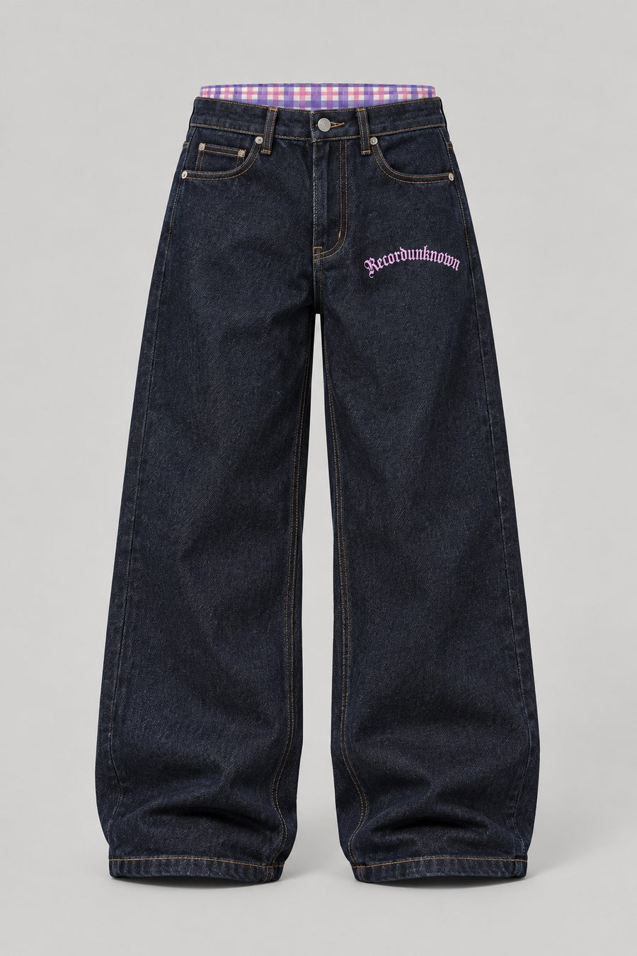 Recordunknown raw indigo wide-leg jeans with flannel waistband trim, front view