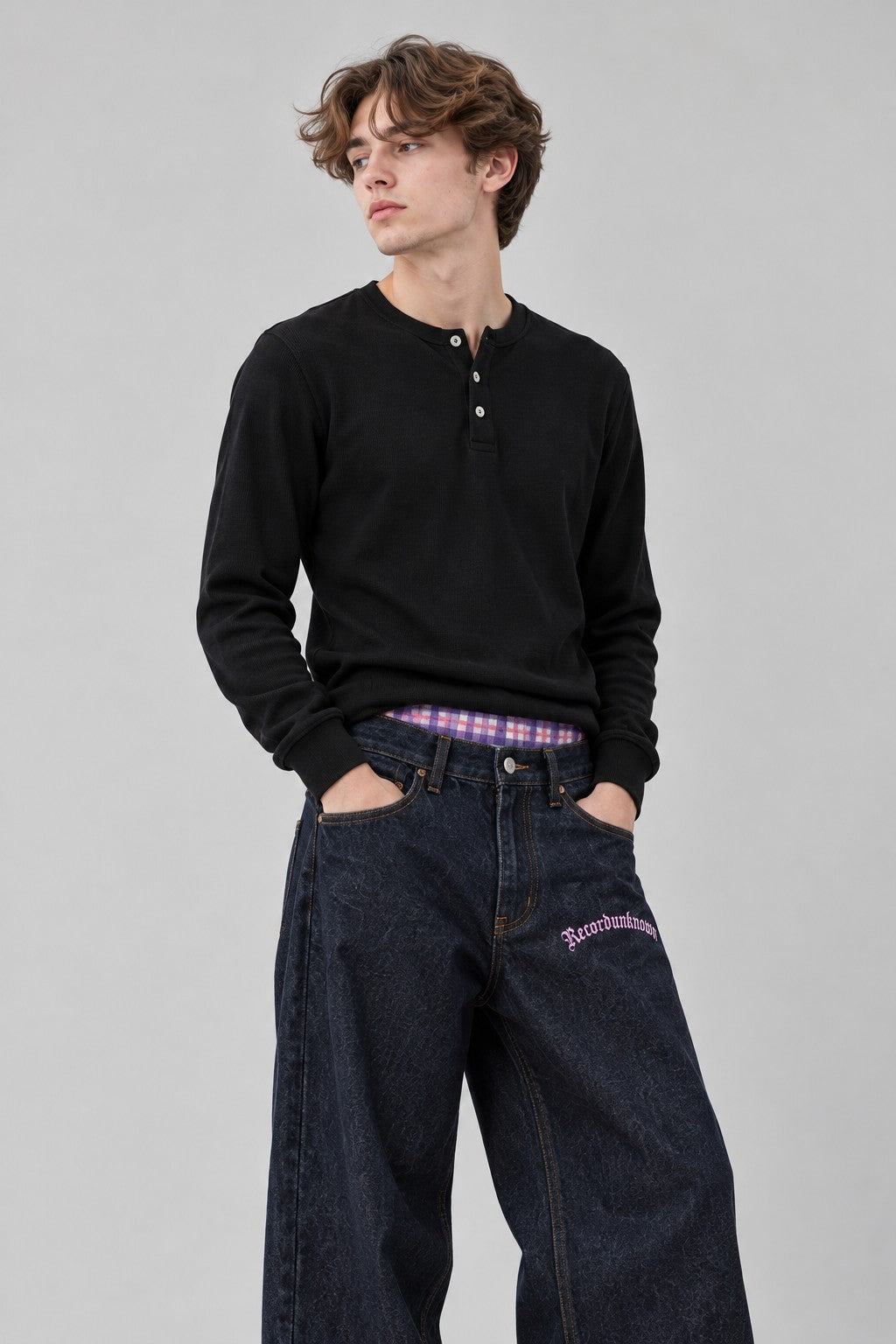 Close-up of the Recordunknown raw denim jeans on a model