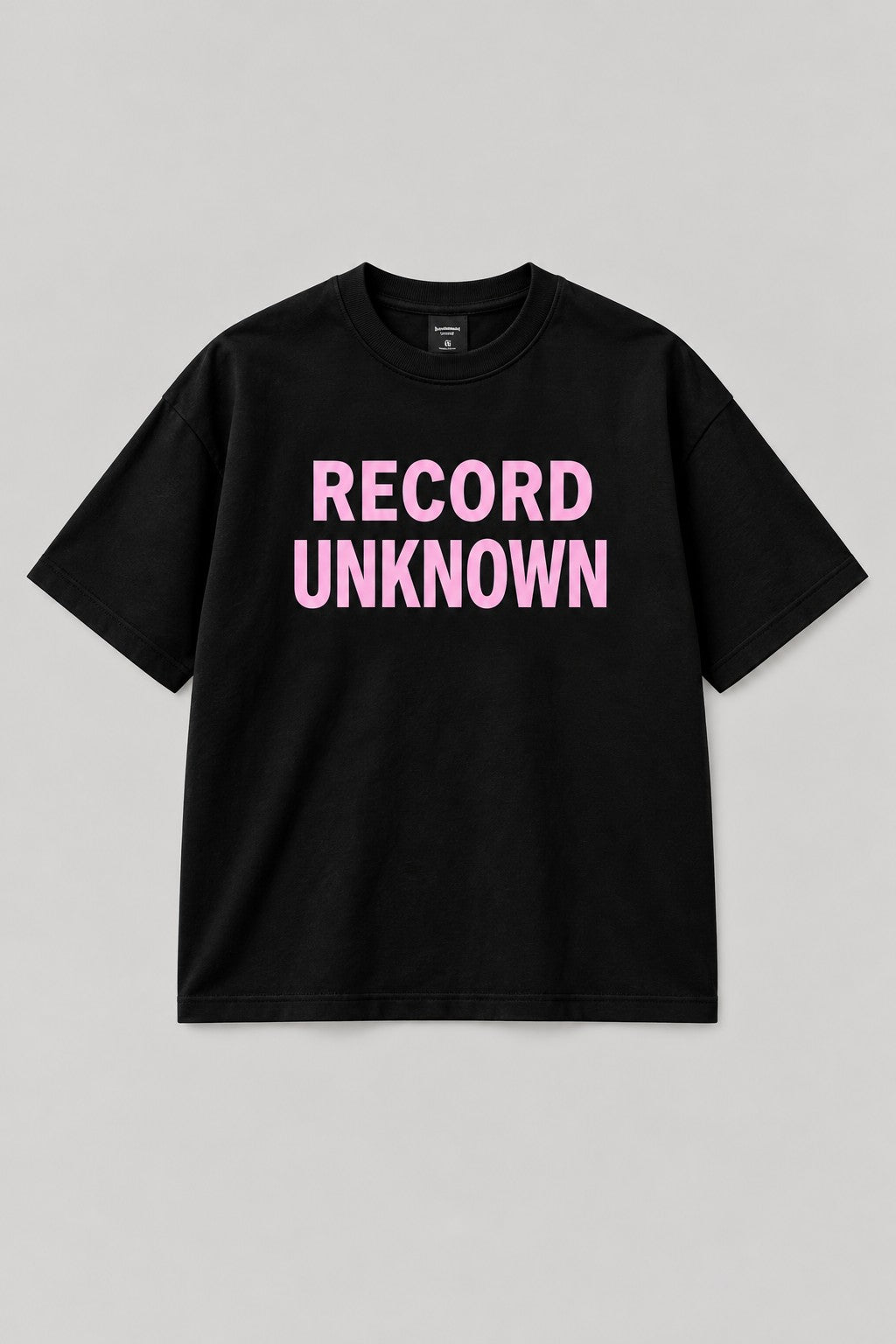 Recordunknown black oversized tee with RECORD UNKNOWN stacked print, front view